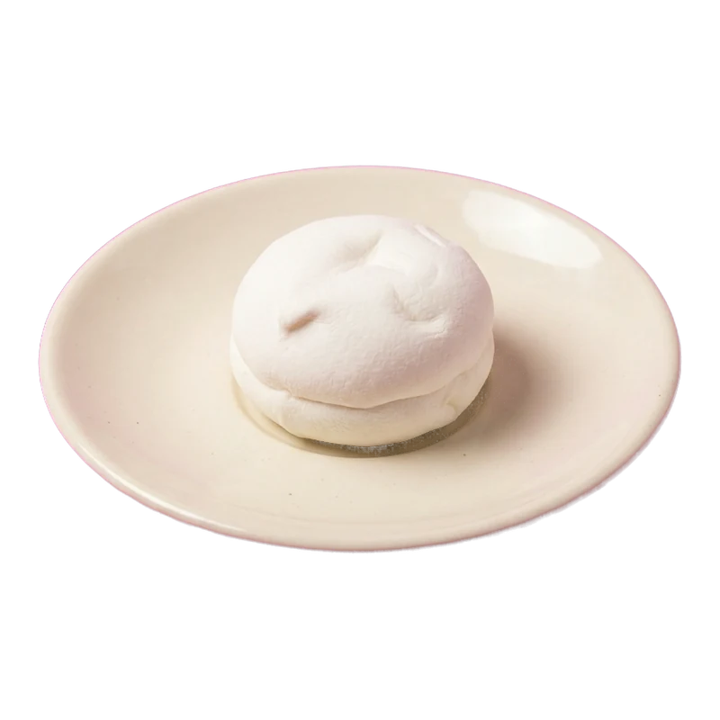 A marshmallow on a saucer